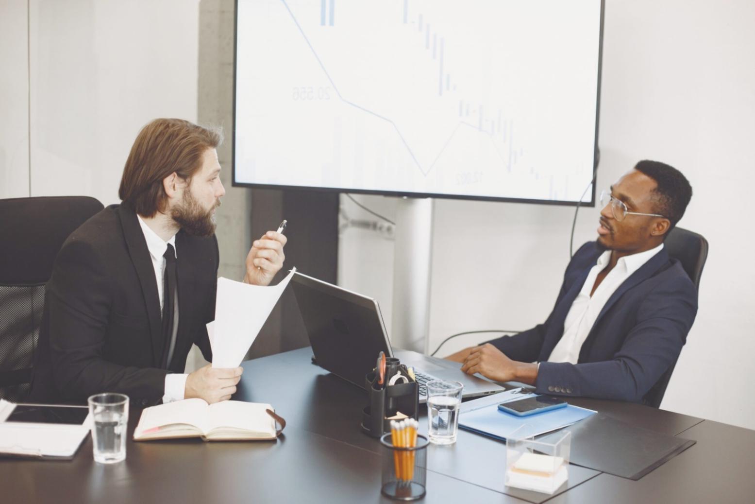 Organized financial documents and calculator showing systematic approach